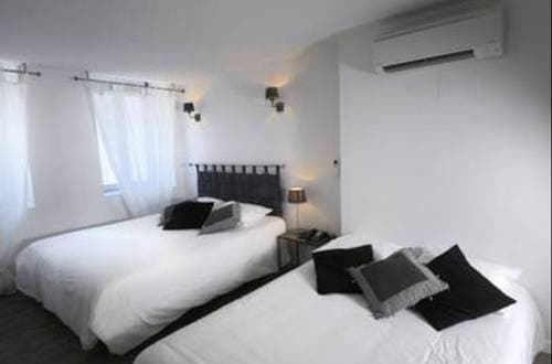 Un Hôtel en Ville - Photo 5