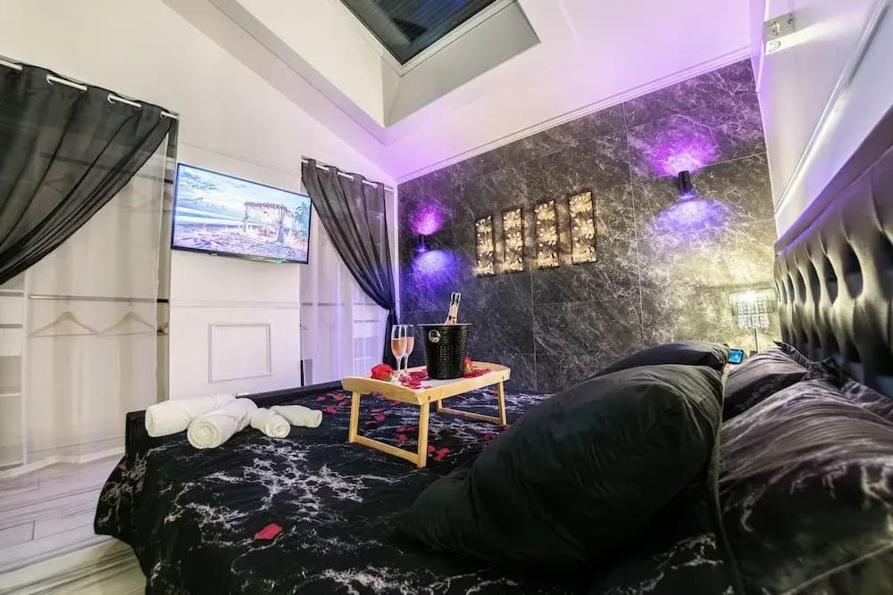 Appart Hotel GLAM88 Suites SPA et SAUNA - Photo 3