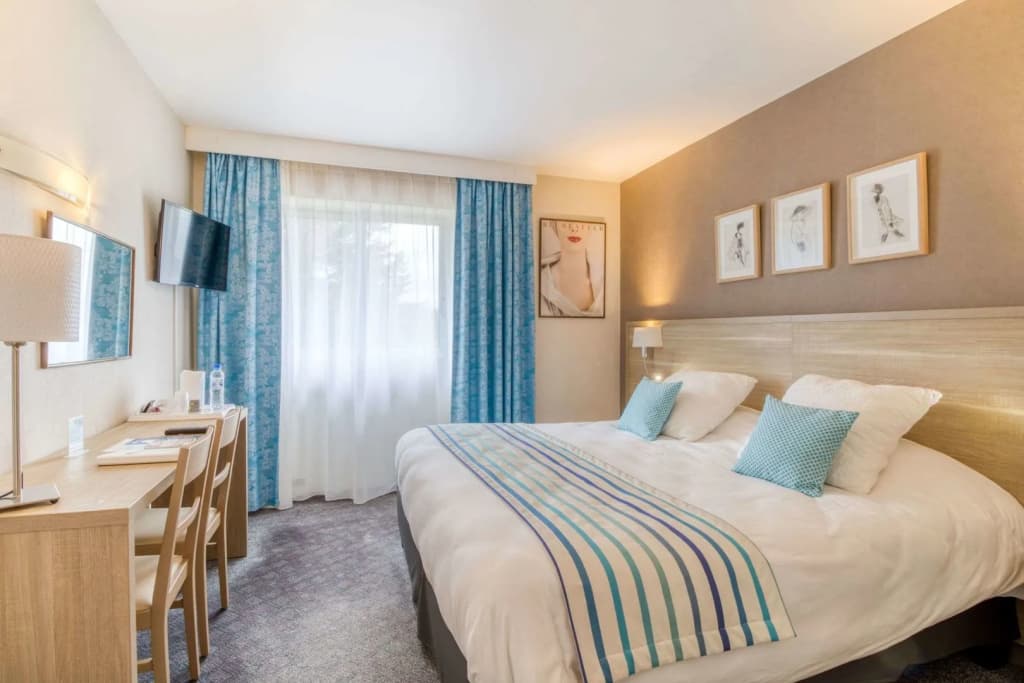 Brit Hotel Le Cygne - Photo 5