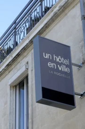 Un Hôtel en Ville - Photo 1