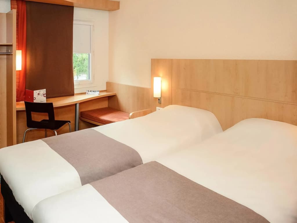 ibis budget Rouen Parc des Expos Zenith - Photo 4