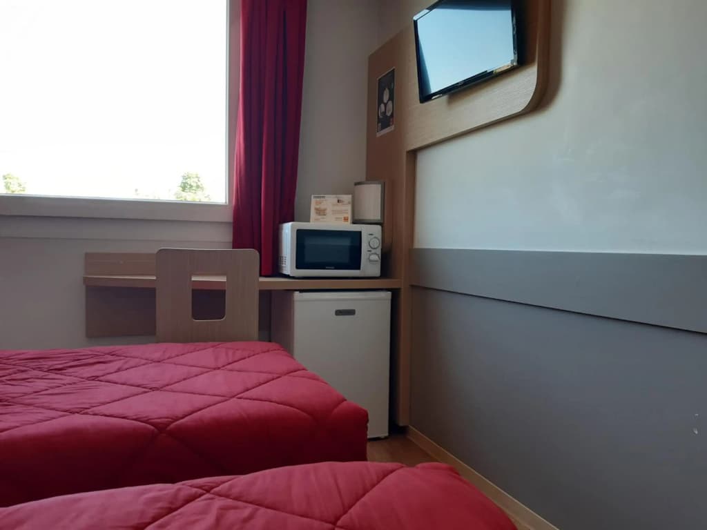 Premiere Classe Reims Nord - Betheny - Photo 4