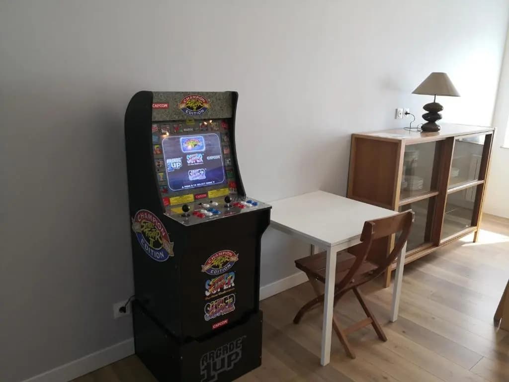 borne d'arcade et 3 salles de bain pour ce T4 - Photo 1