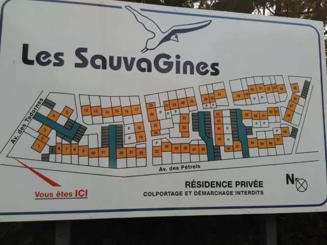 Small house between lake and sea